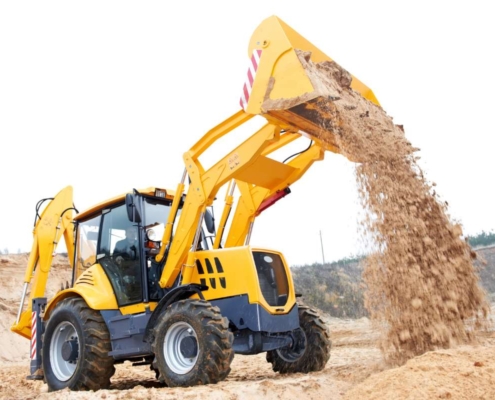 Retroescavadeiras em infraestrutura: preparo do terreno